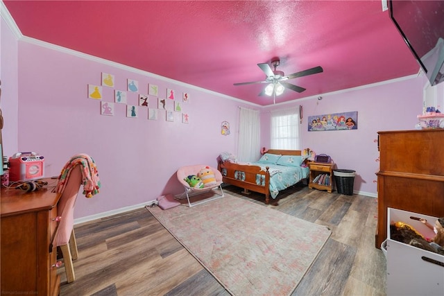 10637 Westwood Dr, Corpus Christi, TX 78410 - bedroom featuring wood finished floors, crown molding, and a ceiling fan