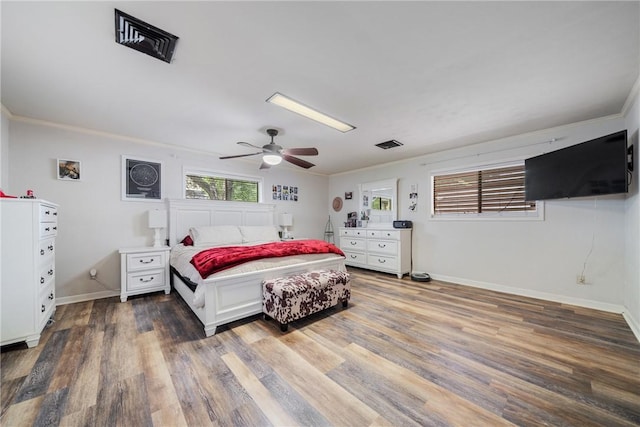 10637 Westwood Dr, Corpus Christi, TX 78410 - bedroom with wood finished floors, a ceiling fan, and ornamental molding