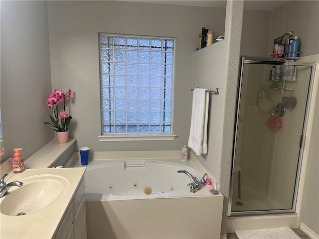 6333 Oso Pkwy, Corpus Christi, TX 78414 - full bathroom with a shower stall, a tub with jets, and vanity