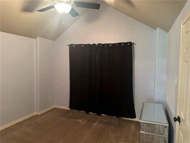 6333 Oso Pkwy, Corpus Christi, TX 78414 - unfurnished bedroom featuring vaulted ceiling, a ceiling fan, dark colored carpet, and baseboards