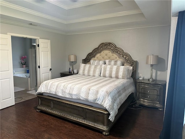 6333 Oso Pkwy, Corpus Christi, TX 78414 - bedroom featuring wood finished floors, a tray ceiling, and ornamental molding