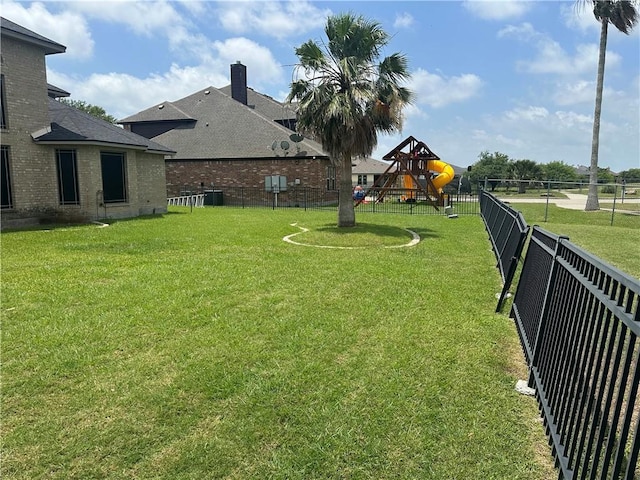 6333 Oso Pkwy, Corpus Christi, TX 78414 - view of yard featuring central air condition unit and a playground