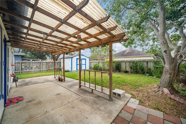 view of patio / terrace with a shed