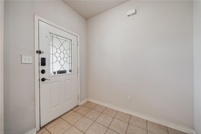 foyer featuring light tile patterned flooring