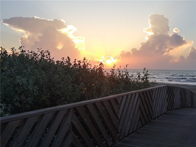 balcony at dusk with a water view