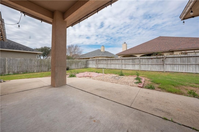 view of patio featuring a fenced backyard