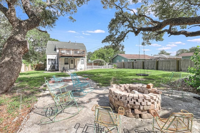 view of patio featuring a fire pit