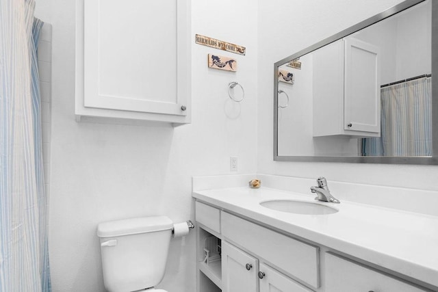 full bath with vanity and toilet