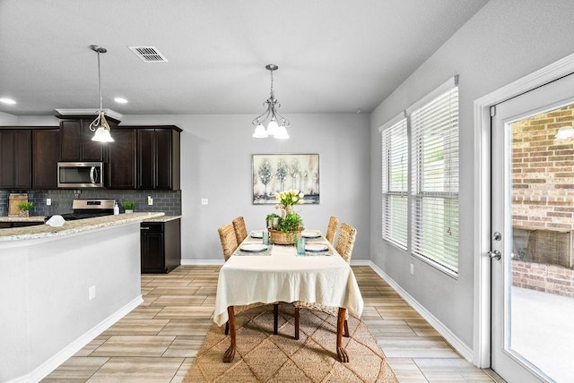 2530 Las Estrellas St, Corpus Christi, TX 78414 - dining room featuring wood tiled floors and recessed lighting