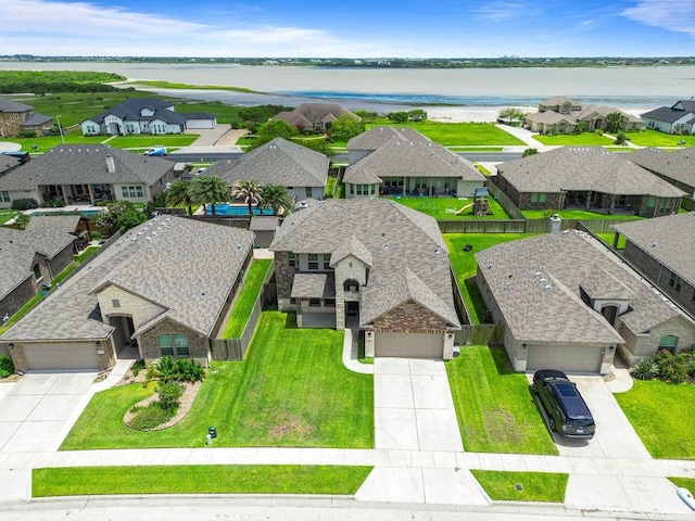 2530 Las Estrellas St, Corpus Christi, TX 78414 - aerial perspective of suburban area featuring a nearby body of water