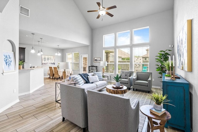 2530 Las Estrellas St, Corpus Christi, TX 78414 - living room with high vaulted ceiling, wood finish floors, and ceiling fan