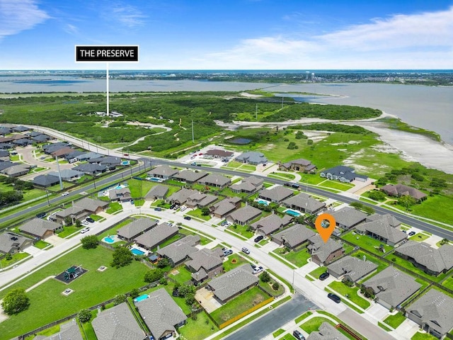 2530 Las Estrellas St, Corpus Christi, TX 78414 - aerial overview of property's location with a large body of water and nearby suburban area