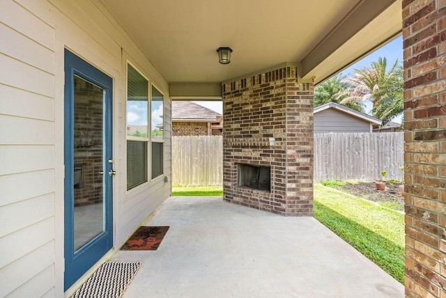 2530 Las Estrellas St, Corpus Christi, TX 78414 - view of patio / terrace with an outdoor brick fireplace