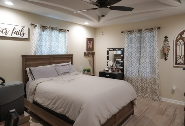 bedroom featuring ceiling fan and light wood-type flooring