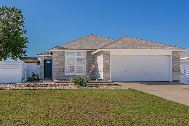13829 Suntan Ave, Corpus Christi, TX 78418 - ranch-style house with a garage, concrete driveway, brick siding, and a shingled roof