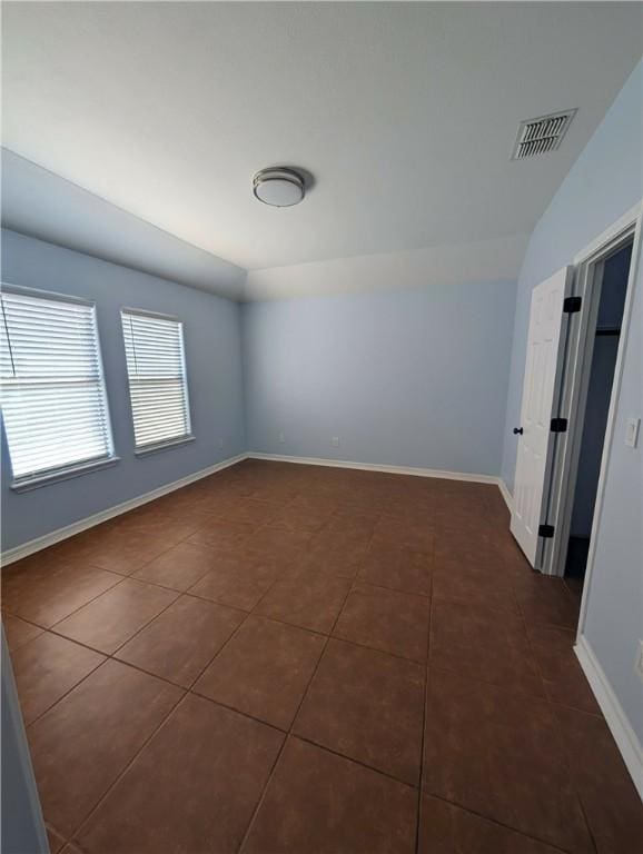 13829 Suntan Ave, Corpus Christi, TX 78418 - spare room featuring dark tile patterned floors