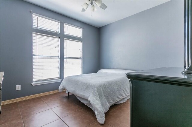 13829 Suntan Ave, Corpus Christi, TX 78418 - bedroom featuring tile patterned floors and ceiling fan