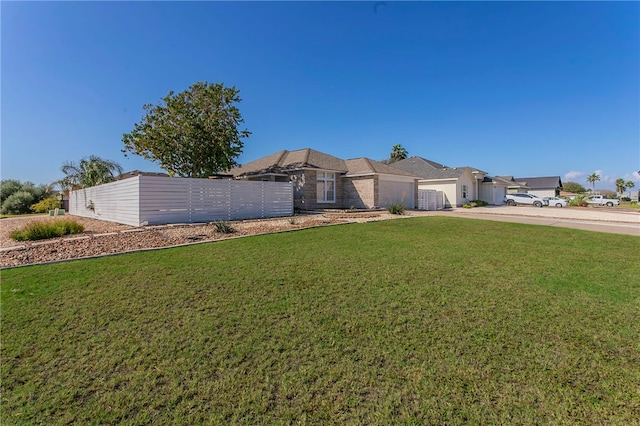 ranch-style house with a front lawn