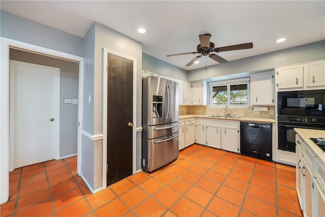 5049 Moultrie Dr, Corpus Christi, TX 78413 - kitchen with black appliances, a sink, light countertops, backsplash, and a ceiling fan