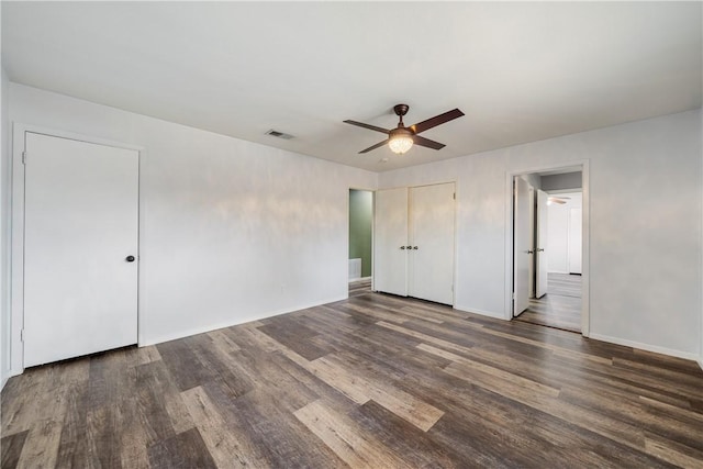 5049 Moultrie Dr, Corpus Christi, TX 78413 - unfurnished bedroom with wood finished floors, baseboards, and ceiling fan