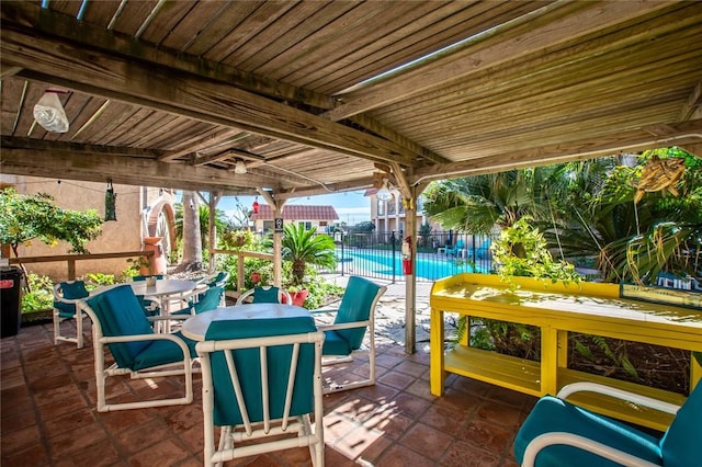 view of patio / terrace featuring a community pool