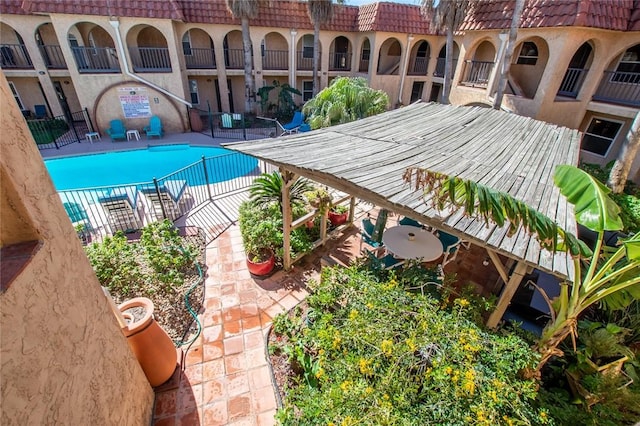 view of pool featuring a patio