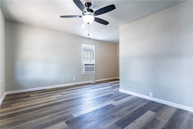 unfurnished room featuring dark wood-type flooring, ceiling fan, and cooling unit