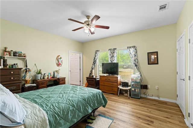 105 E Elm St, Taft, TX 78390 - bedroom with wood finished floors and a ceiling fan