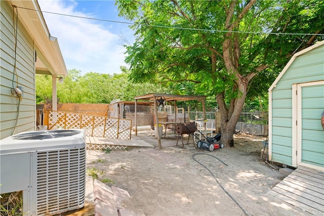 105 E Elm St, Taft, TX 78390 - fenced backyard featuring a patio and a storage shed