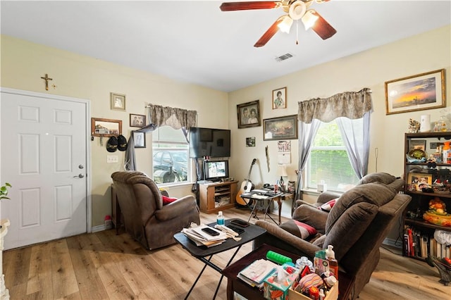 105 E Elm St, Taft, TX 78390 - living area with ceiling fan and light wood-type flooring