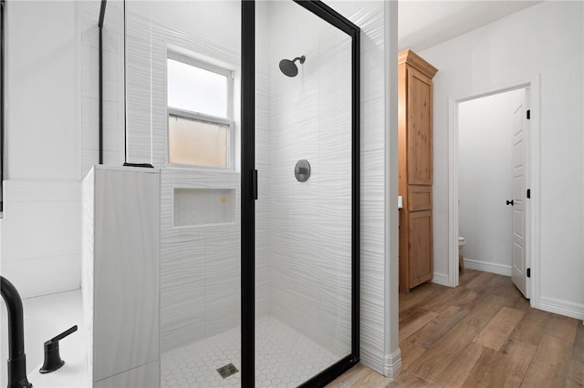 133 Longhorn Dr, Odem, TX 78370 - full bath featuring a shower stall and wood finished floors
