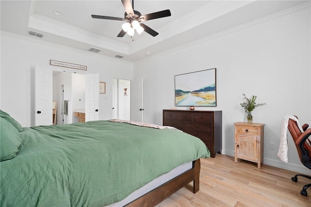 133 Longhorn Dr, Odem, TX 78370 - bedroom featuring a raised ceiling, crown molding, light wood finished floors, and a ceiling fan