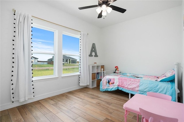 133 Longhorn Dr, Odem, TX 78370 - bedroom featuring wood finished floors and ceiling fan