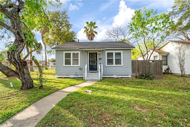 bungalow with a front lawn