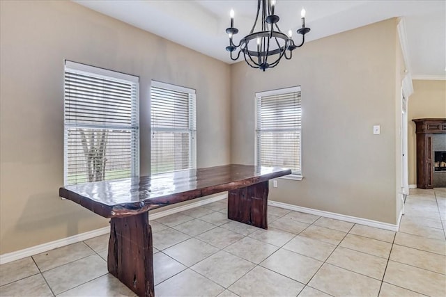 office area with light tile patterned flooring and a notable chandelier