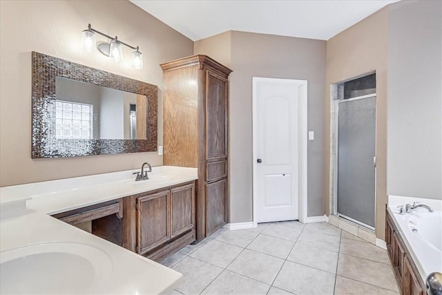 bathroom featuring vanity, tile patterned flooring, and independent shower and bath