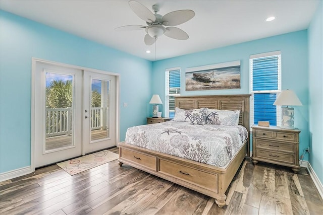 694 Kara Dr, Port Aransas, TX 78373 - bedroom featuring french doors, access to outside, wood finished floors, baseboards, and recessed lighting