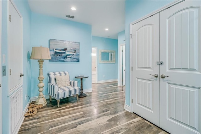 694 Kara Dr, Port Aransas, TX 78373 - living area featuring wood finished floors, baseboards, and recessed lighting
