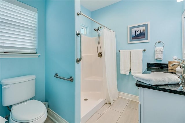 694 Kara Dr, Port Aransas, TX 78373 - bathroom with toilet, a shower stall, vanity, and tile patterned flooring