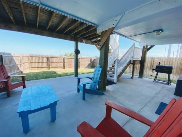 view of patio with a grill