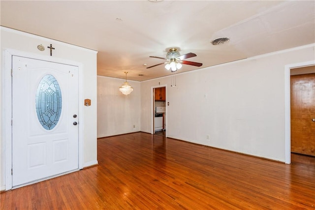 4114 Markins Dr, Corpus Christi, TX 78411 - entryway with wood finished floors, a ceiling fan, and crown molding