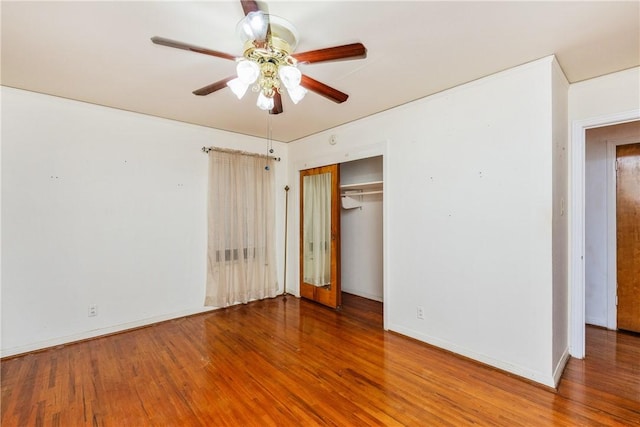 4114 Markins Dr, Corpus Christi, TX 78411 - unfurnished bedroom with wood finished floors, a closet, and a ceiling fan