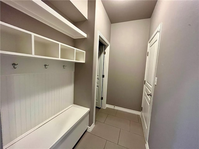 2212 Tallow Dr, Portland, TX 78374 - mudroom with tile patterned floors and baseboards