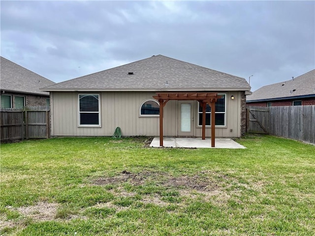 2212 Tallow Dr, Portland, TX 78374 - back of house with a patio, a lawn, a fenced backyard, and a shingled roof