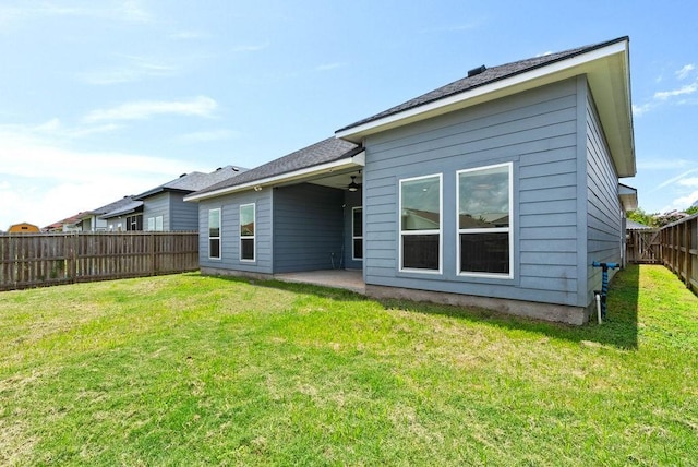 5810 Bella Di Giorno Dr, Corpus Christi, TX 78414 - back of property featuring a fenced backyard, a patio, and a ceiling fan