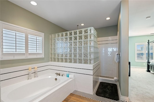 bathroom featuring plus walk in shower