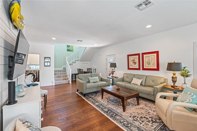 living room featuring dark hardwood / wood-style flooring