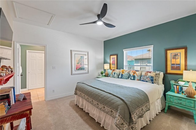 bedroom with ceiling fan and light colored carpet