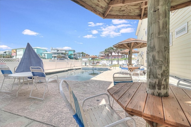 pool featuring a patio area