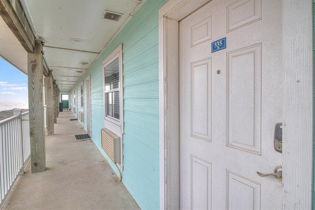 entrance to property featuring visible vents